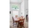 Eat-in dining area with an arched window allowing natural light in at 202 Aylesbury Ln, Davenport, FL 33837
