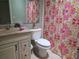 This bathroom offers a tub, toilet, sink and vanity at 209 Silas Phelps W Ct, Orlando, FL 32828