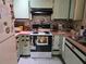 Functional kitchen featuring modern appliances and tile backsplash at 209 Silas Phelps W Ct, Orlando, FL 32828