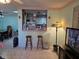 Comfortable living room area with bar access at 209 Silas Phelps W Ct, Orlando, FL 32828