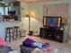 Comfortable living room area with bar access at 209 Silas Phelps W Ct, Orlando, FL 32828