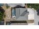 Aerial view of a home with a backyard featuring a screened-in swimming pool and patio at 339 Sigmund Loop, Davenport, FL 33837