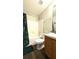 Bright bathroom featuring a shower-tub combo and a light wood vanity at 339 Sigmund Loop, Davenport, FL 33837