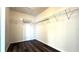 Walk in closet with dark wood floors and white shelving at 339 Sigmund Loop, Davenport, FL 33837