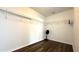 Walk in closet with dark wood floors and white shelving at 339 Sigmund Loop, Davenport, FL 33837