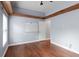 Bedroom featuring hardwood floors, a window for natural light and a whiteboard at 4353 Steed Ter, Winter Park, FL 32792