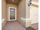 Front entrance featuring a modern black door and brick-paved entryway next to a spacious garage at 8828 Bengal Ct, Kissimmee, FL 34747