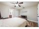 Comfortable bedroom with wood floors, a cozy bed, and wood furniture, creating a relaxing and inviting space at 1052 Dees Dr, Oviedo, FL 32765