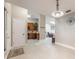 Open floor plan boasts a kitchen and living room view from the front door at 1052 Dees Dr, Oviedo, FL 32765