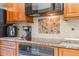 Modern kitchen with stainless steel appliances and granite countertops at 1052 Dees Dr, Oviedo, FL 32765