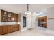 Bright kitchen nook with wood cabinets, countertop, and lots of storage space at 1052 Dees Dr, Oviedo, FL 32765
