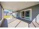 Screened lanai with brick floors and view of the backyard at 1052 Dees Dr, Oviedo, FL 32765