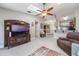 Bright and spacious living room with a ceiling fan and an open layout at 1052 Dees Dr, Oviedo, FL 32765