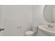 Clean half bath features a modern sink, toilet, and neutral wall paint at 14154 Shocklach Dr, Winter Garden, FL 34787
