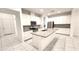 Modern kitchen features white cabinets, stainless appliances, and a large center island with a breakfast bar at 14154 Shocklach Dr, Winter Garden, FL 34787