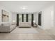 Living room featuring modern decor, light-colored sofas, dark curtains, and a stylish painting on the wall at 14154 Shocklach Dr, Winter Garden, FL 34787