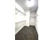 Walk-in closet with carpeted floor and wire shelving units for optimal storage at 14154 Shocklach Dr, Winter Garden, FL 34787