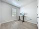 Cozy bedroom featuring a desk and large window, perfect for a home office at 2240 Osprey Ave, Orlando, FL 32814