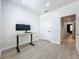 Well-lit bedroom, featuring a desk and a large window at 2240 Osprey Ave, Orlando, FL 32814