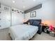 A bedroom featuring a sofa bed, with a white closet at 2240 Osprey Ave, Orlando, FL 32814