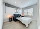 Cozy bedroom with a sofa bed, perfect for guests or a home office at 2240 Osprey Ave, Orlando, FL 32814