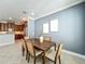 Open concept dining room features tile flooring, neutral paint, recessed lighting, and open access to the kitchen at 2240 Osprey Ave, Orlando, FL 32814