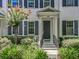 Inviting home entrance with a well-manicured garden and a stylish front door at 2240 Osprey Ave, Orlando, FL 32814