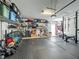Functional garage space with storage solutions and exercise equipment at 2240 Osprey Ave, Orlando, FL 32814