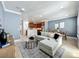 Open concept living room features tile floors, recessed lighting, and open access to the kitchen and dining area at 2240 Osprey Ave, Orlando, FL 32814