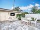 Charming patio featuring a dining table set and outdoor seating area with pavers and outdoor TV at 2240 Osprey Ave, Orlando, FL 32814