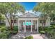 Inviting community pool area framed by trees and a building entrance providing a serene view at 2240 Osprey Ave, Orlando, FL 32814