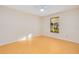 Empty bedroom with tile floor and windows allowing natural light to stream in at 2921 Sabal Palm Dr, Edgewater, FL 32141