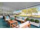 Outdoor patio area with stylish furniture, perfect for entertaining or enjoying the serene backyard views at 2921 Sabal Palm Dr, Edgewater, FL 32141