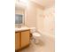 Bright bathroom with a single sink vanity, tile flooring, and a shower-tub combo at 6506 Swissco Dr # 1317, Orlando, FL 32822
