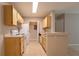Practical kitchen with standard appliances and ample cabinet storage at 6506 Swissco Dr # 1317, Orlando, FL 32822