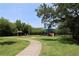 Outdoor play area with a colorful playground and picnic area at 6506 Swissco Dr # 1317, Orlando, FL 32822