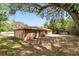 Exterior back of home with spacious backyard at 100 Des Pinar Ln, Longwood, FL 32750