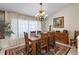Spacious dining room featuring a wooden table set and traditional style at 1017 American Beauty St, Orlando, FL 32818