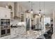 Modern kitchen featuring stainless steel appliances, updated cabinetry, and a large island with seating at 1017 American Beauty St, Orlando, FL 32818