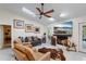Bright living room features a cozy fireplace, skylight, and unique decorative elements at 1017 American Beauty St, Orlando, FL 32818