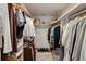 Organized walk-in closet with ample hanging and shelf space for clothing and accessories at 1017 American Beauty St, Orlando, FL 32818