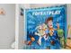 Bright bathroom featuring a Toy Story themed shower curtain at 113 St Thomas Dr, Mulberry, FL 33860