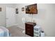 Relaxing bedroom with carpet flooring, a fan, and a three-drawer dresser with ample storage at 113 St Thomas Dr, Mulberry, FL 33860