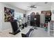 Bonus room with workout equipment and laminate flooring at 113 St Thomas Dr, Mulberry, FL 33860