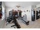 Bonus room with workout equipment and laminate flooring at 113 St Thomas Dr, Mulberry, FL 33860