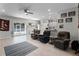 Living room with chairs and laminate flooring at 113 St Thomas Dr, Mulberry, FL 33860