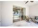 Patio with outdoor seating and sliding glass doors to the interior at 113 St Thomas Dr, Mulberry, FL 33860