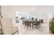 Inviting living space with open floor plan, dining area, and ample natural light at 114 Tulip Ln, Poinciana, FL 34759