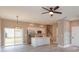 Modern kitchen featuring stainless steel appliances, a kitchen island, and an open floor plan at 1340 Crystal Lake E Ave, Orlando, FL 32806