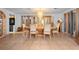 Bright dining room features tile floors, chandelier, and furniture for formal entertaining at 1430 Clarks Summit Ct, Orlando, FL 32828